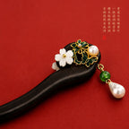 Close up of traditional Chinese intangible heritage style porcelain flower hairpin detail