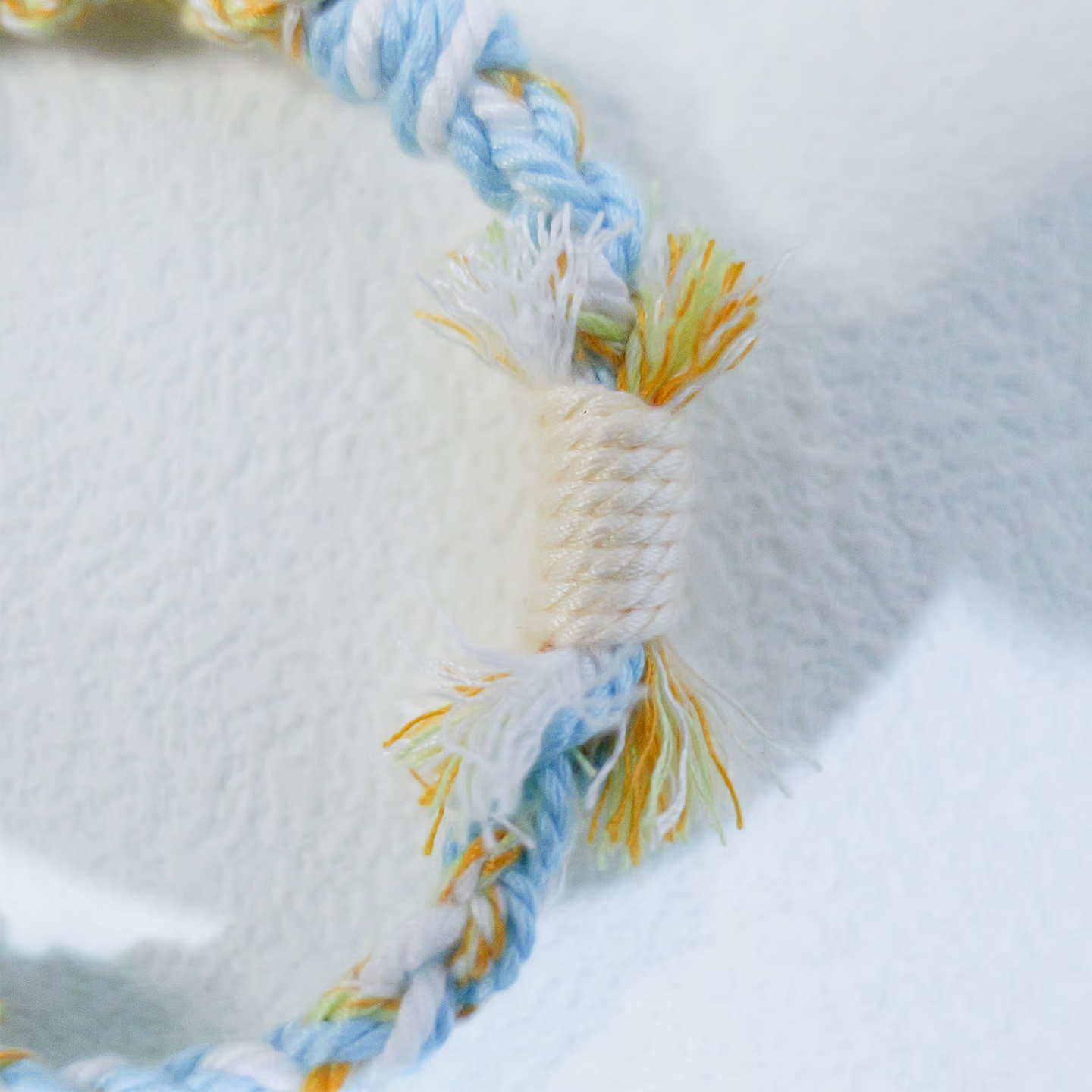 Floral inspiration graphic showing blue hydrangeas and handmade sky blue woven bracelet
