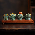 Set of cute green blue sandstone Pixiu statues with gold coin persimmon and fish accessories on wooden display