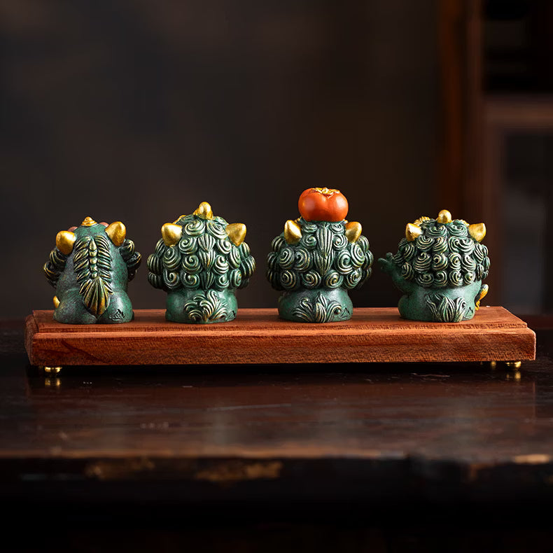 Set of cute green blue sandstone Pixiu statues with gold coin persimmon and fish accessories on wooden display