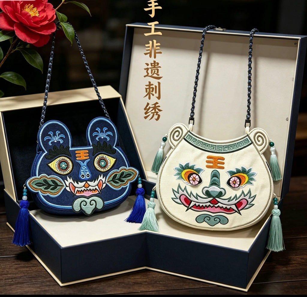 Collection of handcrafted Longxi embroidery tiger head crossbody bags in off-white and blue with long tassels