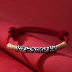 Pair of S999 fine silver auspicious cloud hand-cast tube bracelets on red and black hand-woven cords