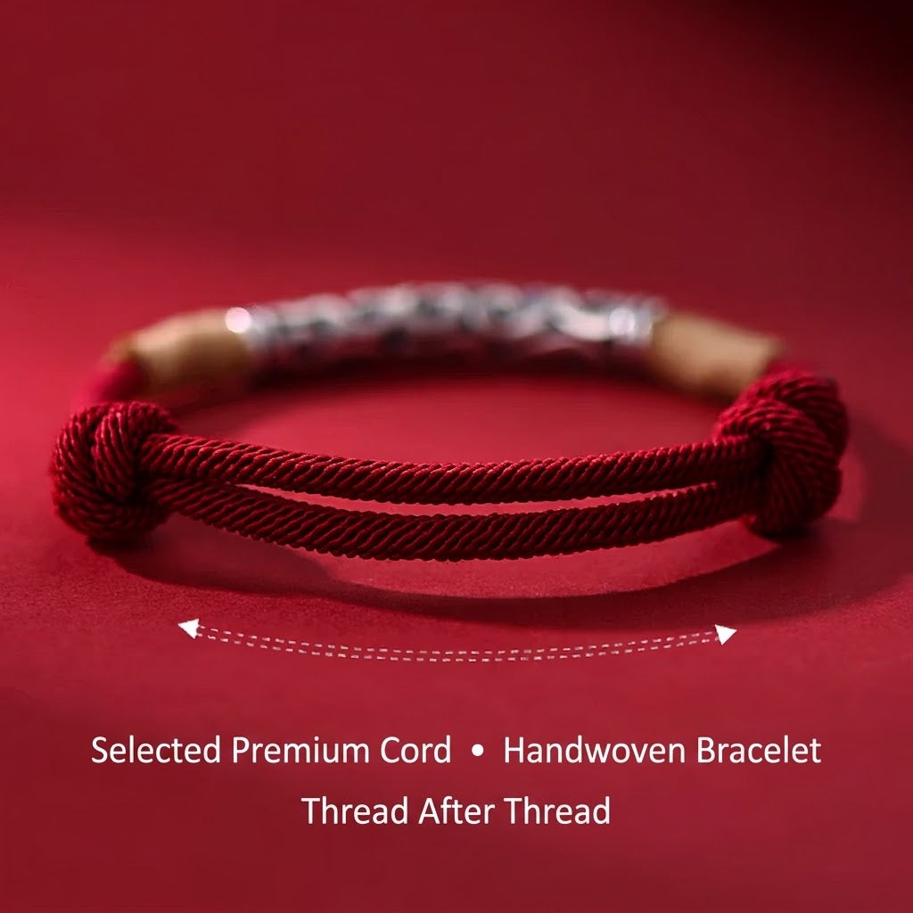 Pair of S999 fine silver auspicious cloud hand-cast tube bracelets on red and black hand-woven cords