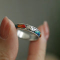 Close up of surface applied multicolor enamel fox tail details on vintage sterling silver ring band