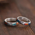 Close up of surface applied multicolor enamel fox tail details on vintage sterling silver ring band