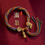 Handmade Tibetan 5-color braided cord bracelet with golden prayer wheel charm and leaves