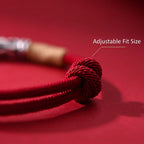 Pair of S999 fine silver auspicious cloud hand-cast tube bracelets on red and black hand-woven cords