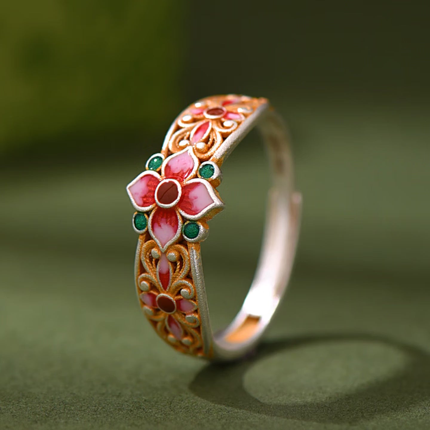 Handmade Chinese enamel silver ring with hand painted pink and green floral detail and gold gilded filigree