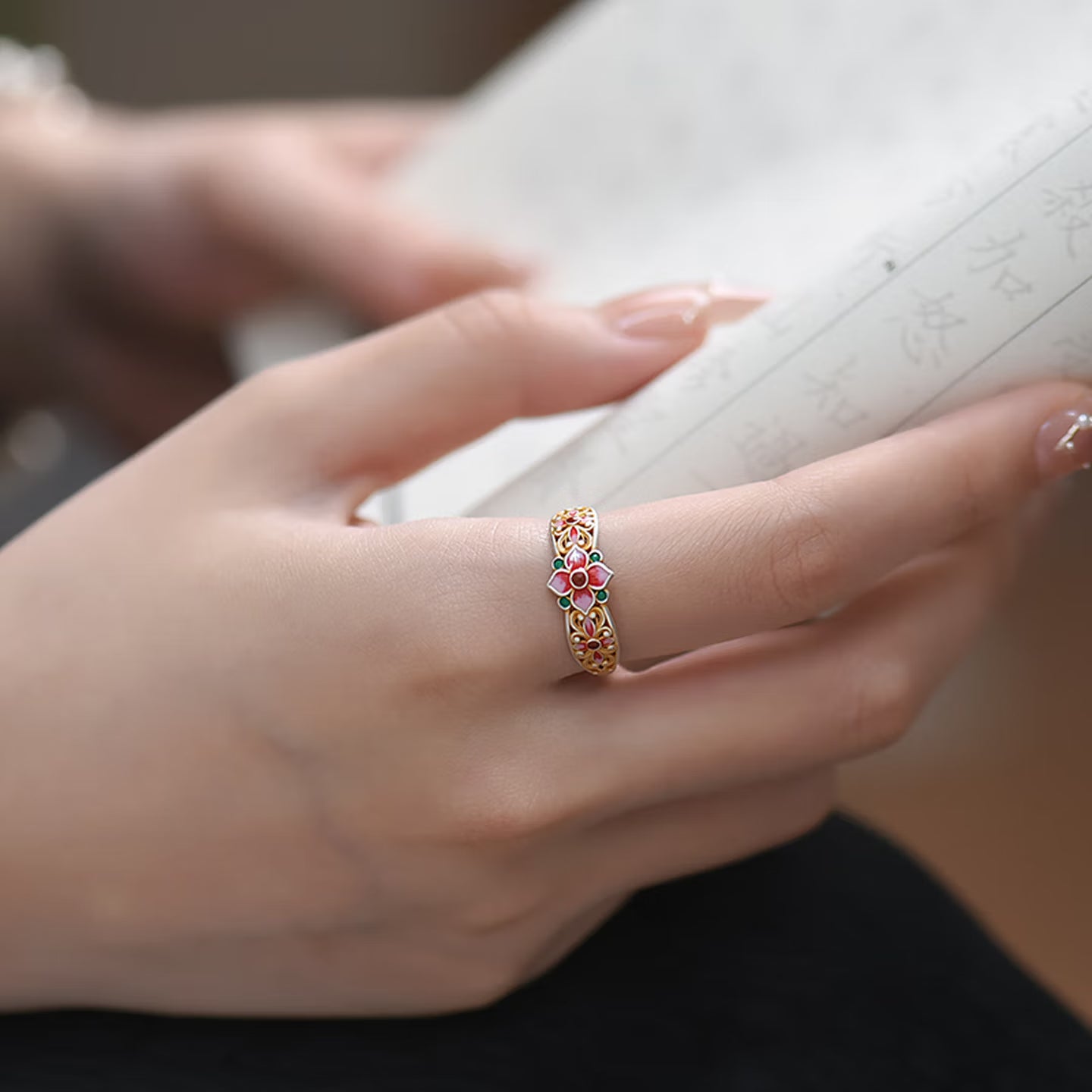 Handmade Chinese enamel silver ring with hand painted pink and green floral detail and gold gilded filigree