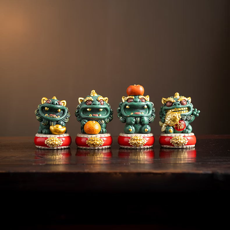 Set of cute green blue sandstone Pixiu statues with gold coin persimmon and fish accessories on wooden display