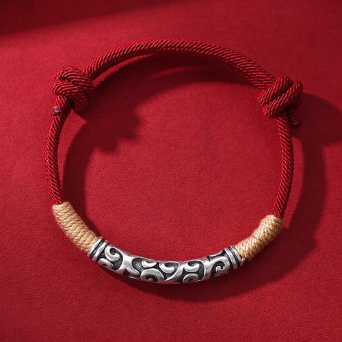 Pair of S999 fine silver auspicious cloud hand-cast tube bracelets on red and black hand-woven cords