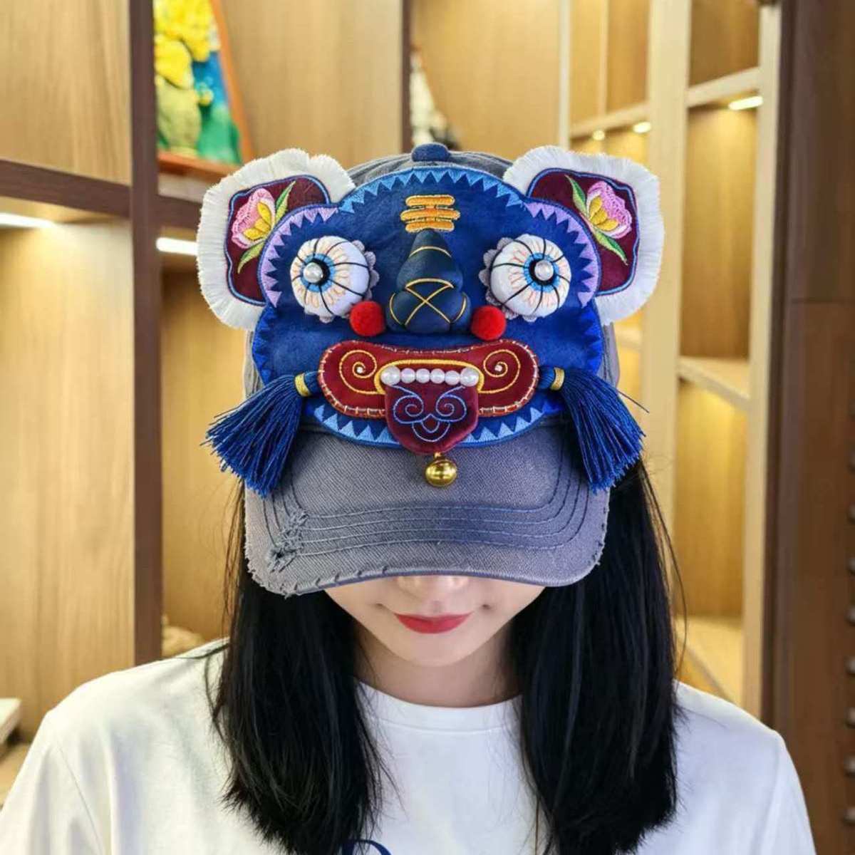Handcrafted vintage denim tiger head baseball cap with 3D embroidery pearl accents and tassels