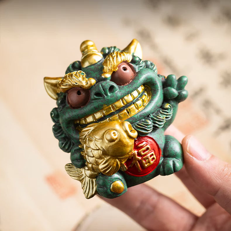 Set of cute green blue sandstone Pixiu statues with gold coin persimmon and fish accessories on wooden display